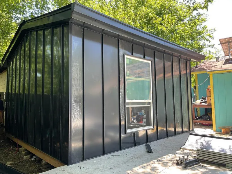 Black standing seam metal wall panels for Roof Inspection in Franklin Park