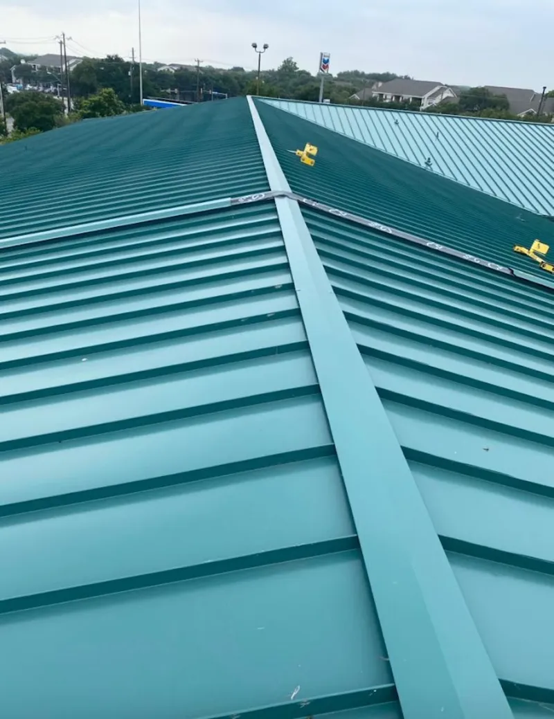 Green commercial metal roof ridge and valley for Metal Roof Repair in Franklin Park